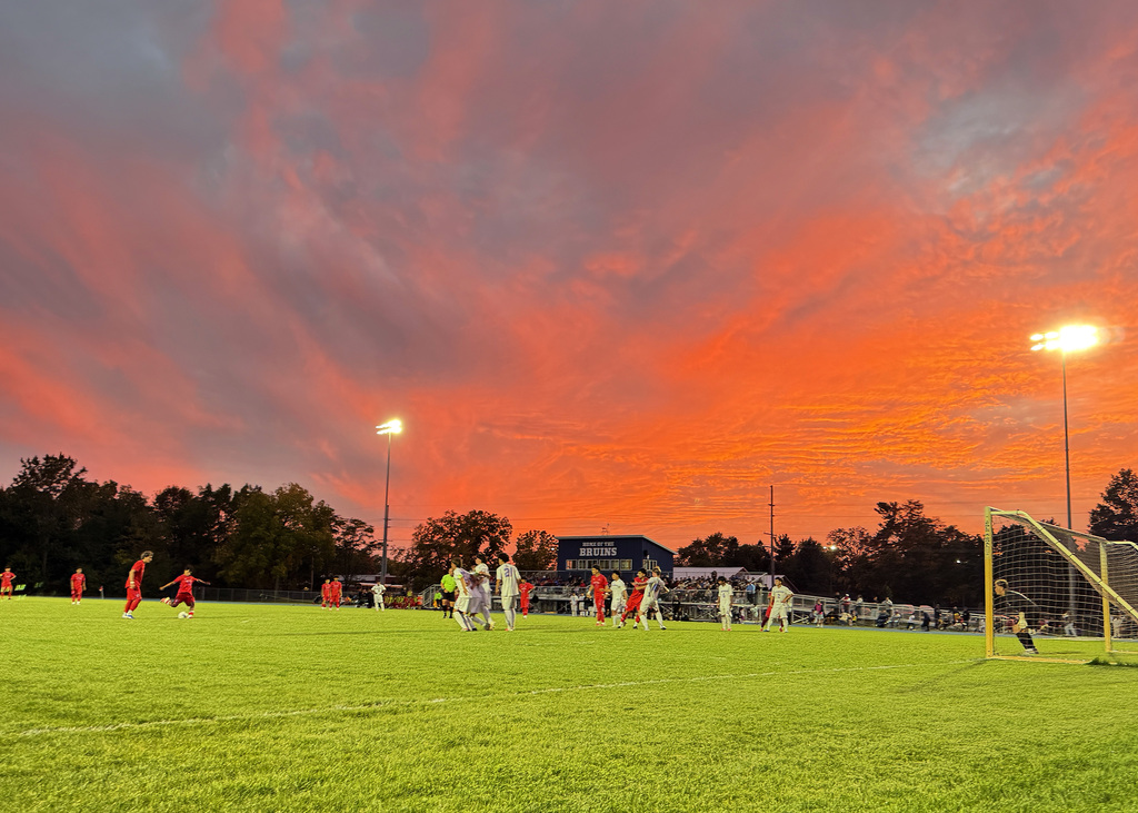 soccer game at sunset