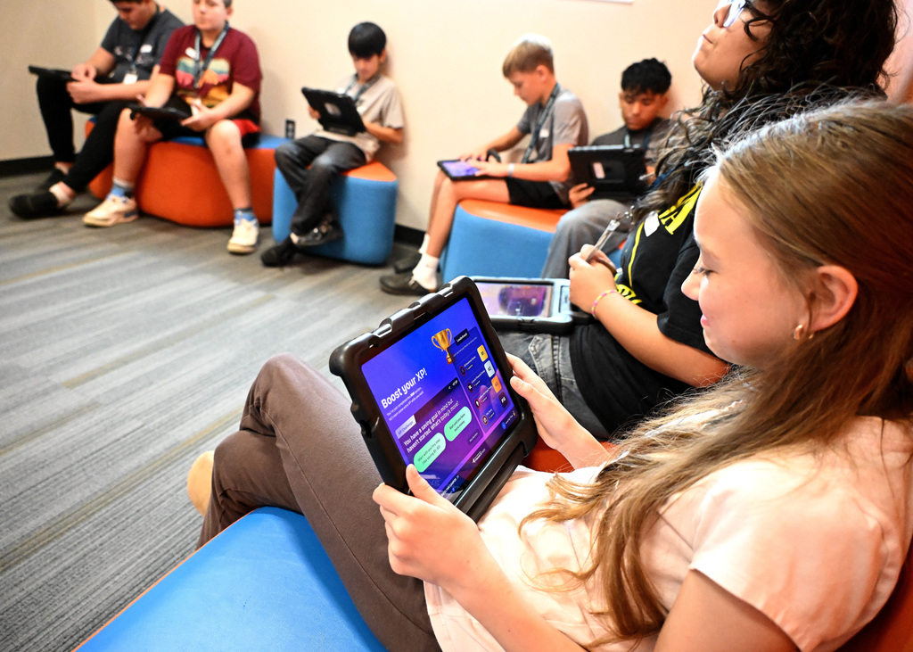 Students working on tablets