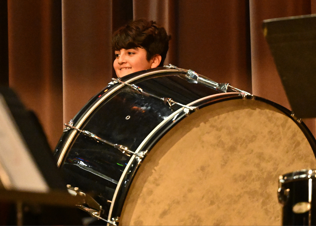 students in a band playing instruments
