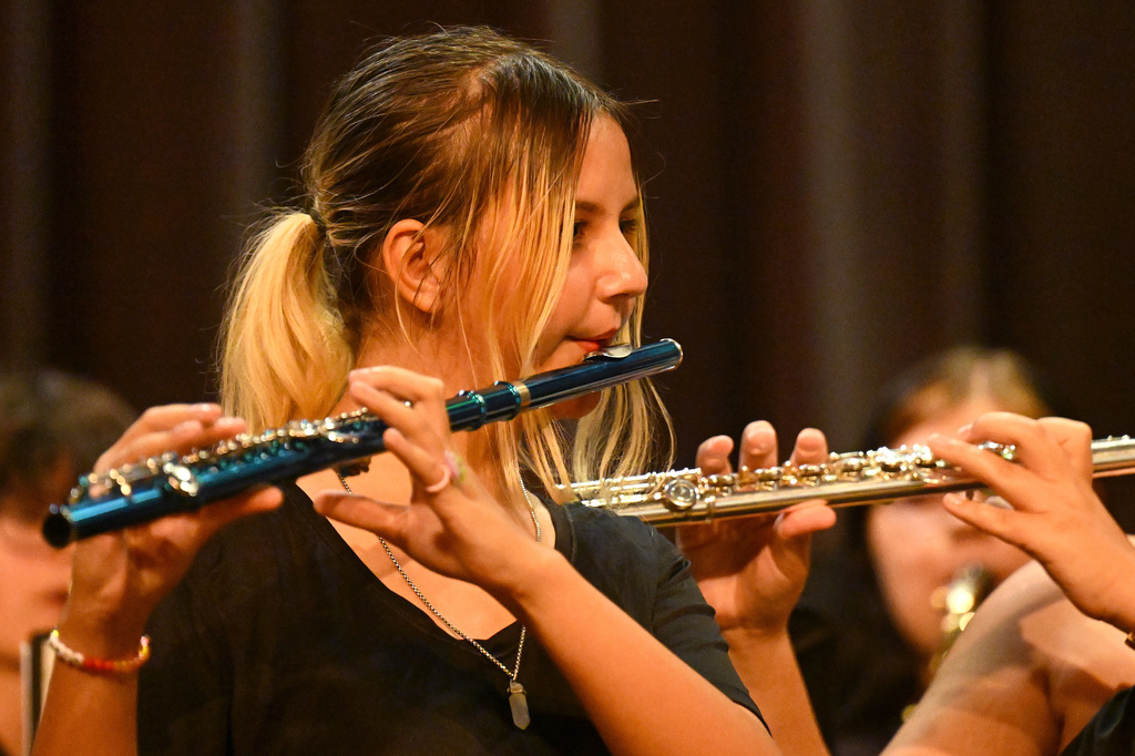 students in a band playing instruments
