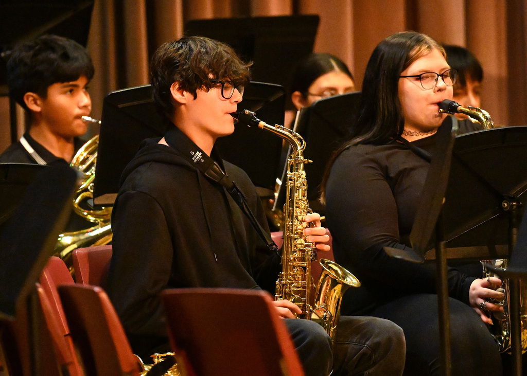 students in a band playing instruments