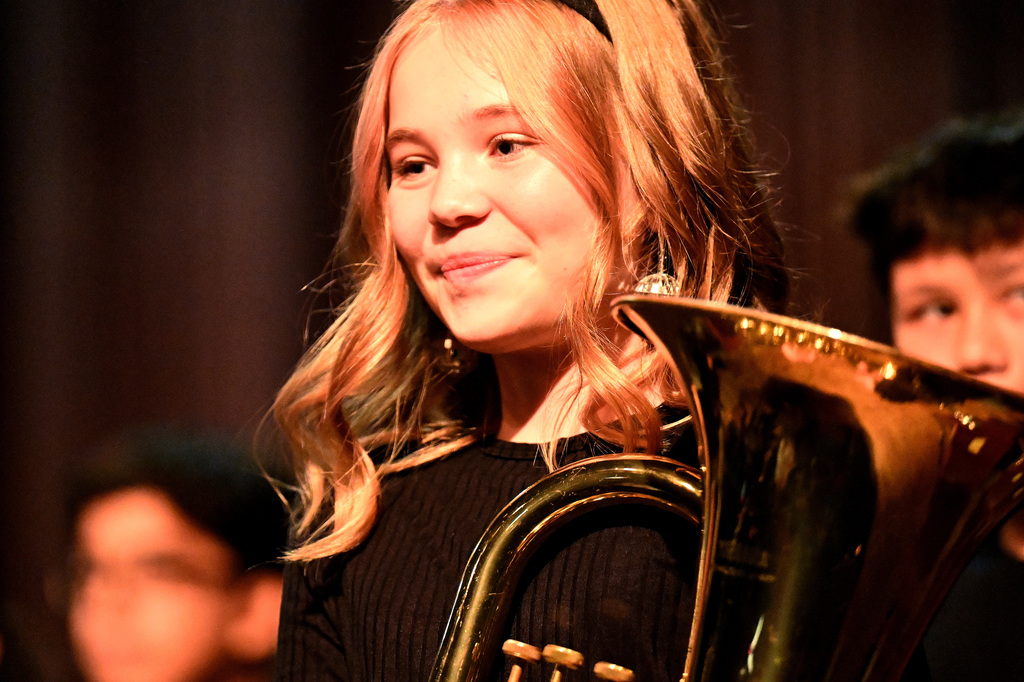 students in a band playing instruments