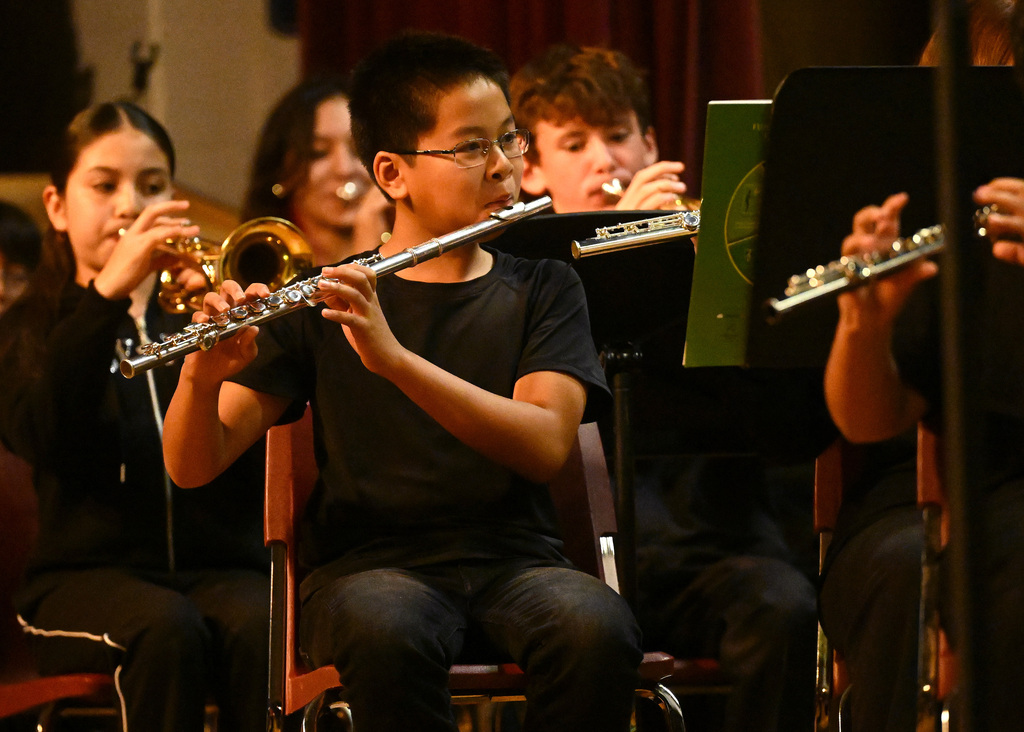 students in a band playing instruments