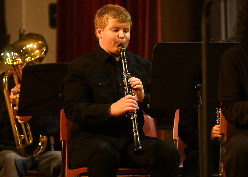 students in a band playing instruments