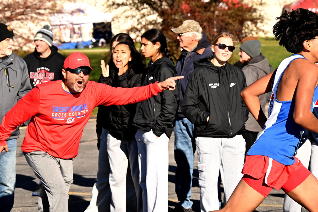 a coach coaching his team