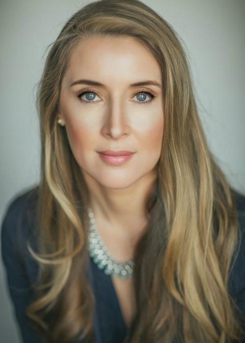 photo of a woman in a blue sweater