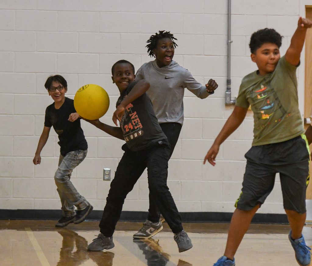 group of boys playing at WOSE kickball game