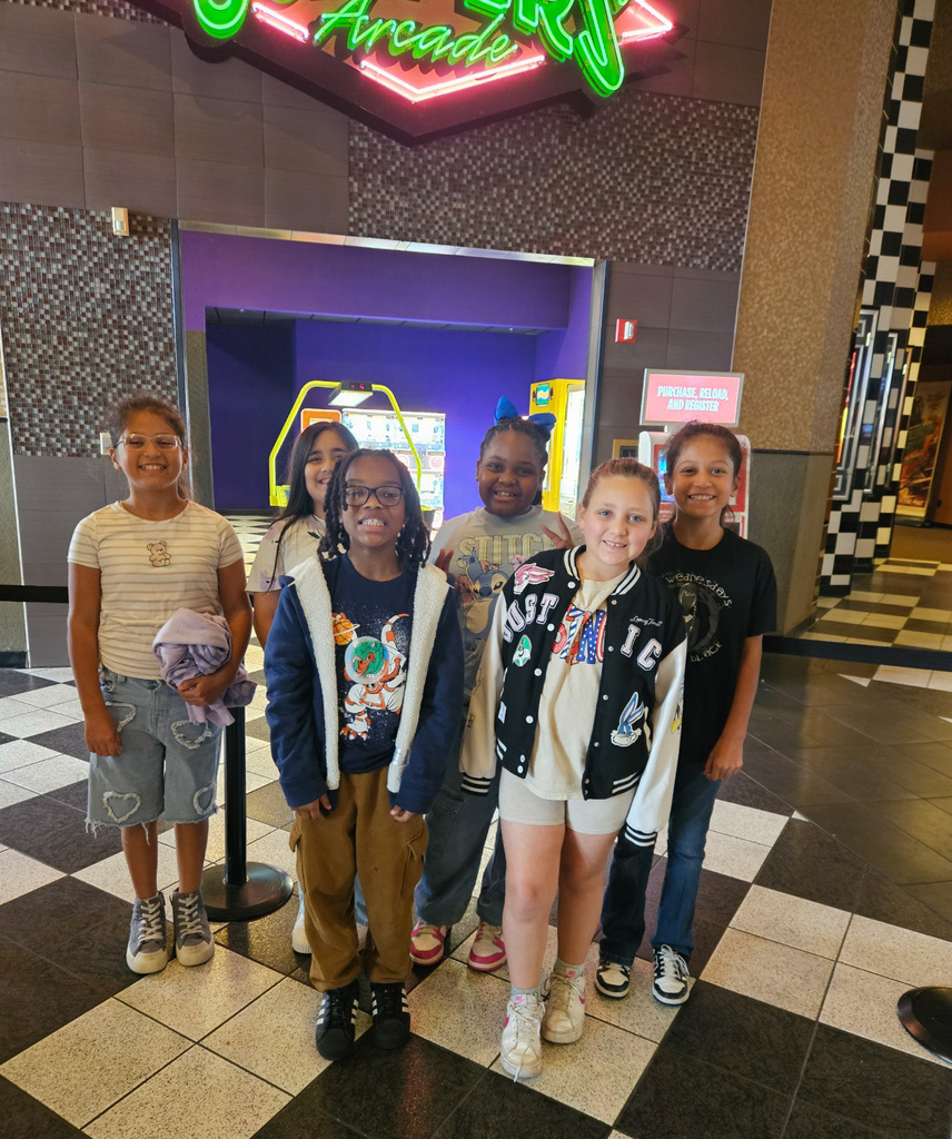 students at a theater to watch The Sheep Detectives