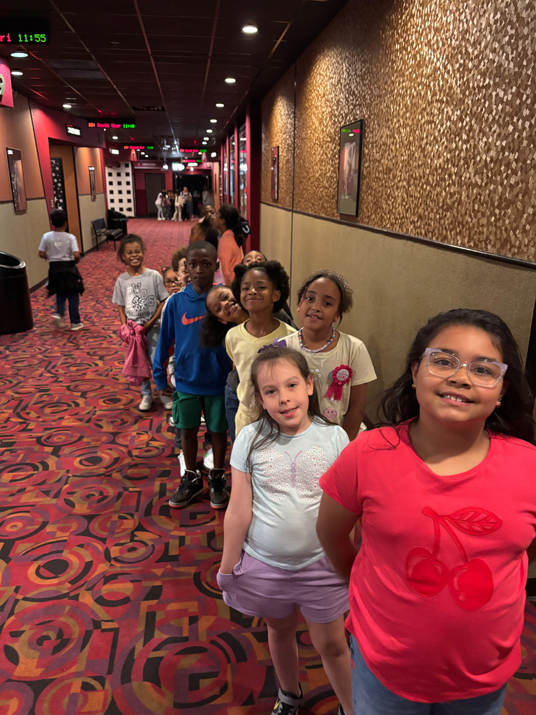students at a theater to watch The Sheep Detectives