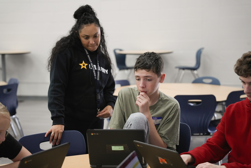 Counselor helping student with schedule