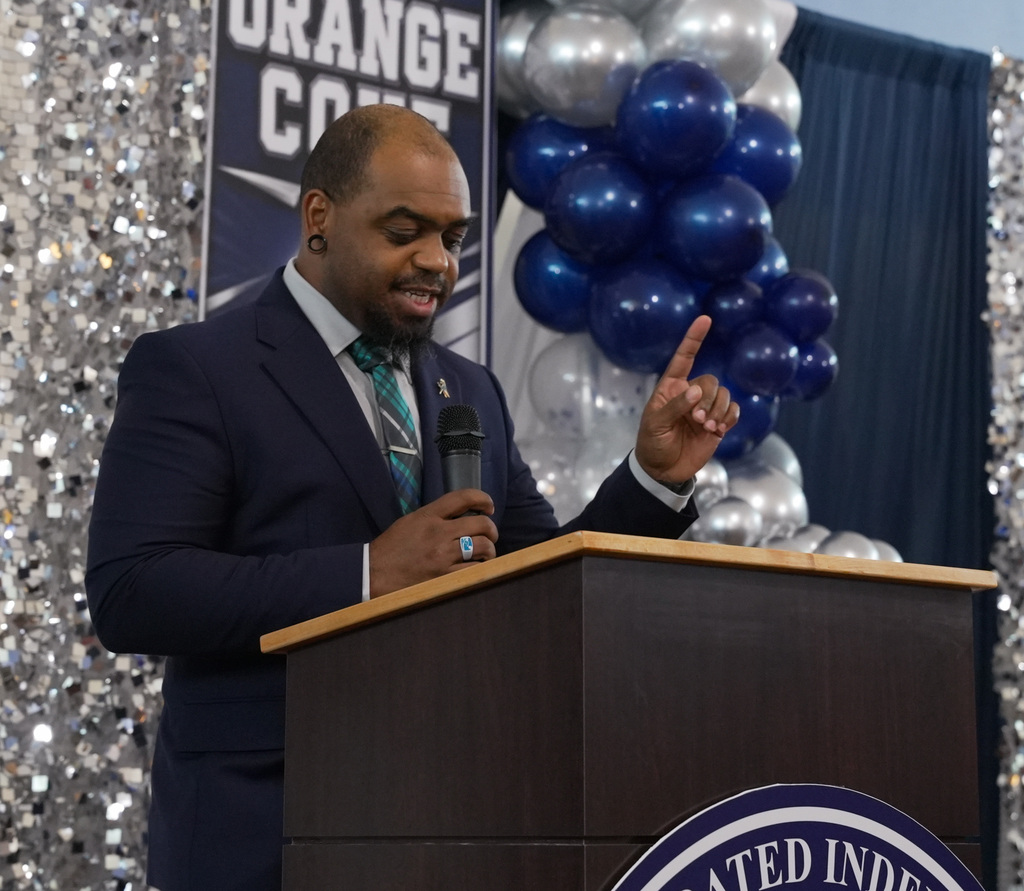 Mr.Junious giving a welcoming speech to all attendees of the ceremony.