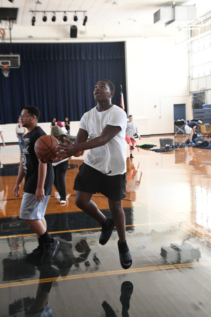 Student playing basketball