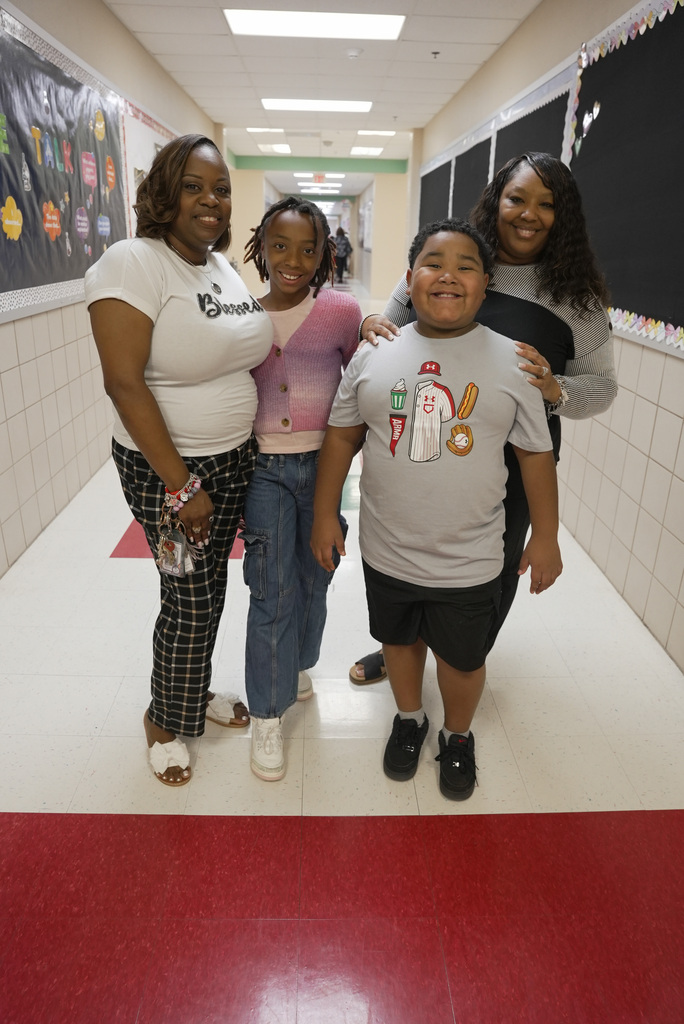 Grandparent and children at school event