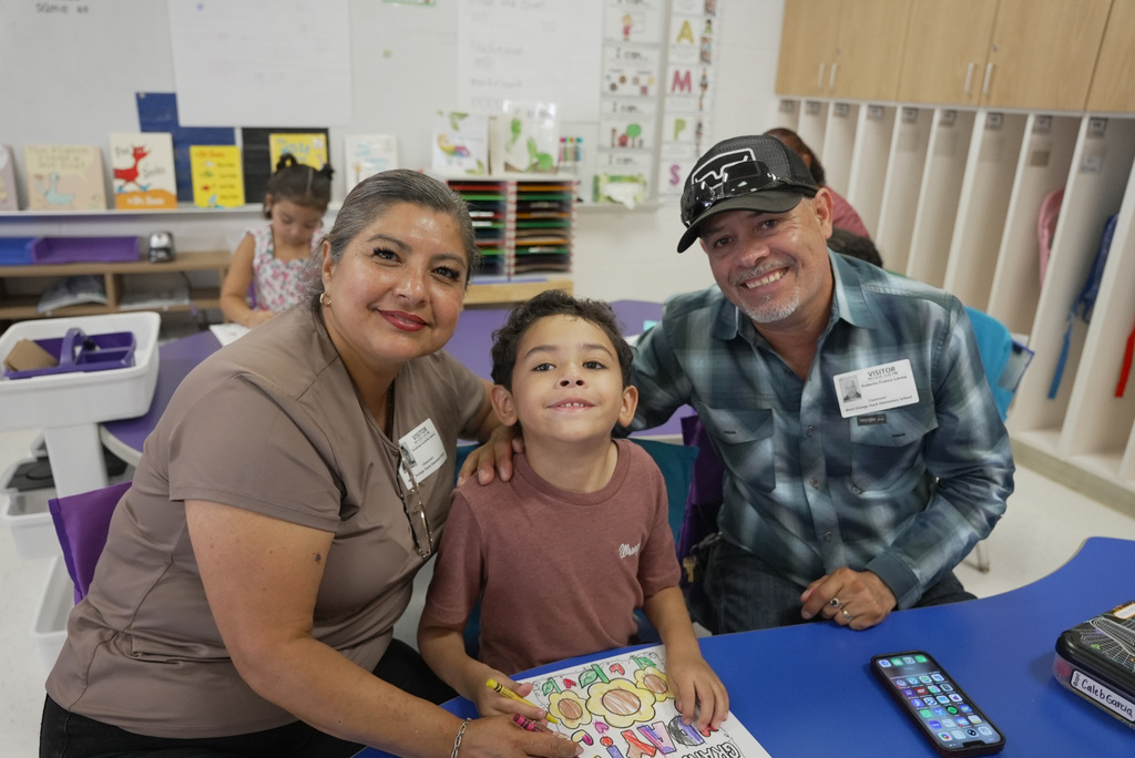 Grandparent and children at school event