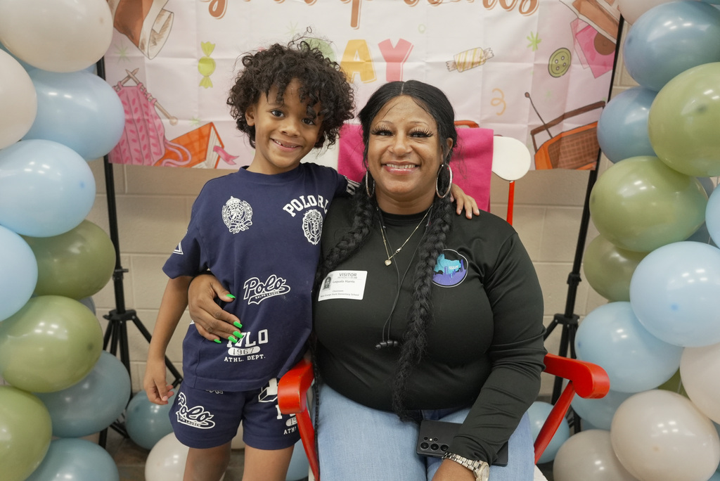 Grandparent and children at school event