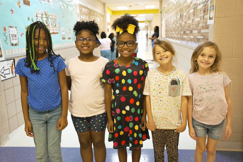 students with dots on them