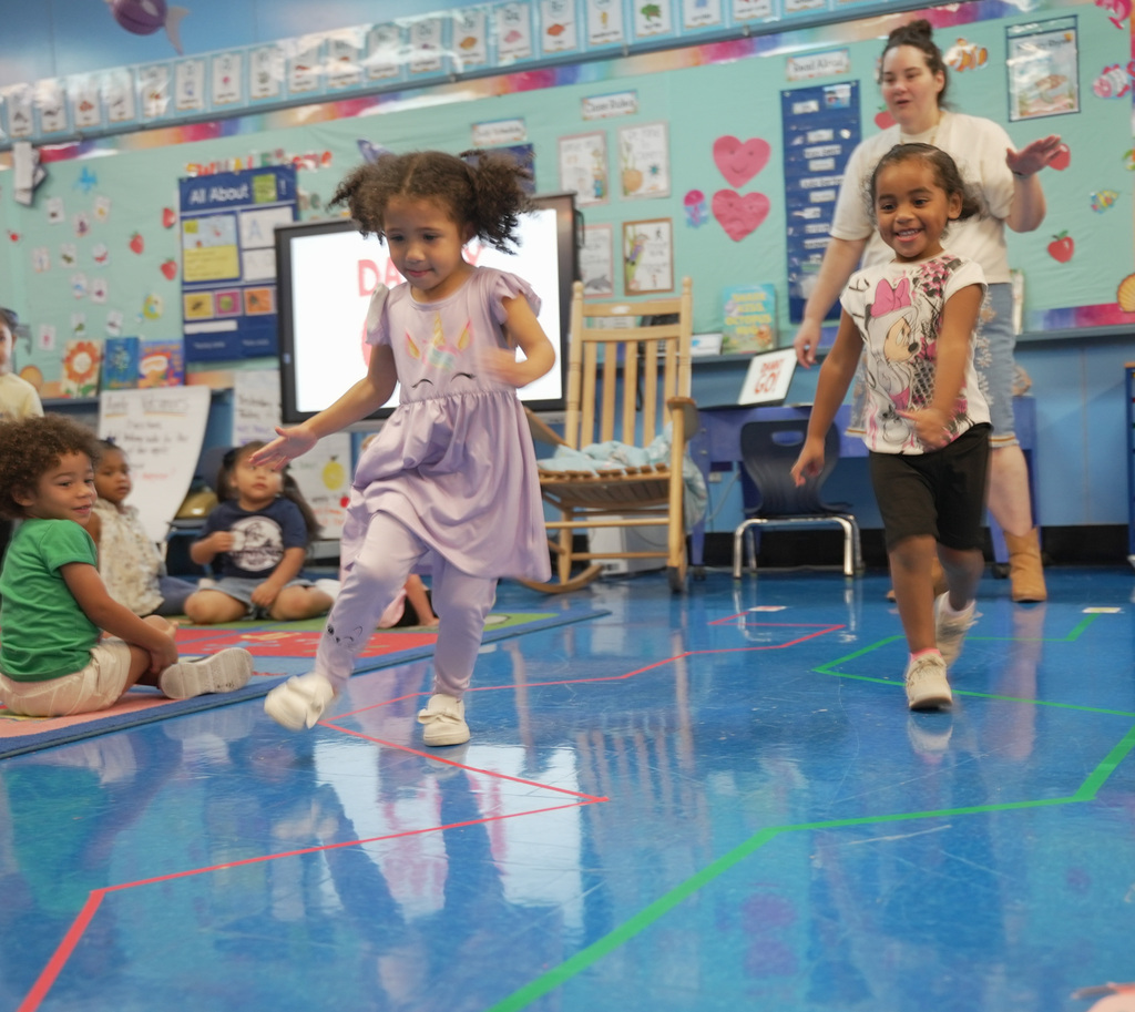 two girls following a line to race