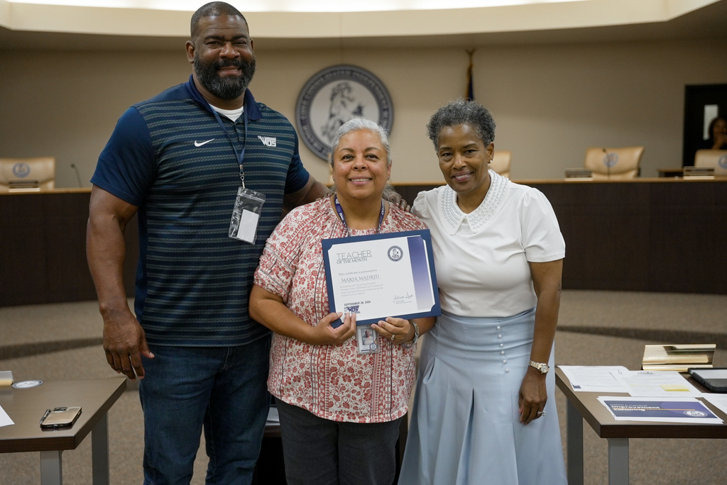 WOSHS principal with Superintendent and September Teacher of the Month