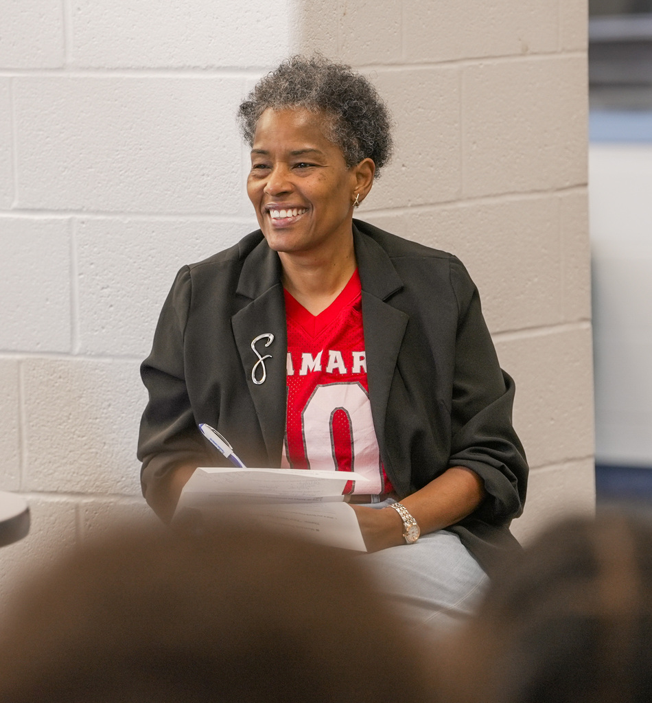 Superintendent Dr. Sigee smiling at a student response