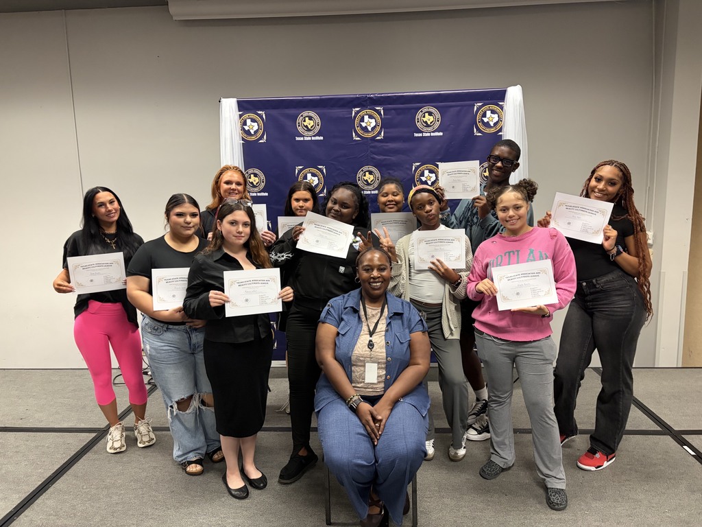 WOSHS Cosmetology students show of their certificates from The 82nd Convention of the Texas State Association and Beauty Culturalist League