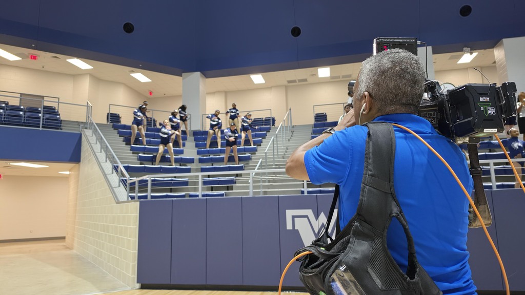 News photographer filming WOS Fillies