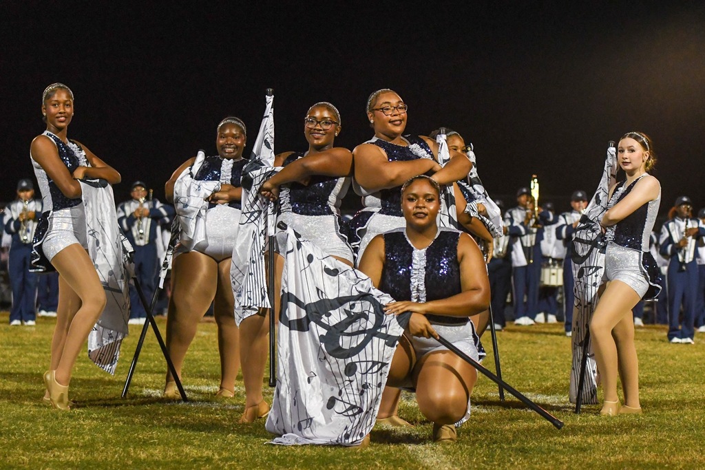 The flag team group photo at the end of their halftime performance