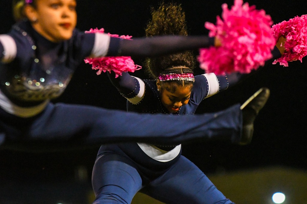 dance team mid jump