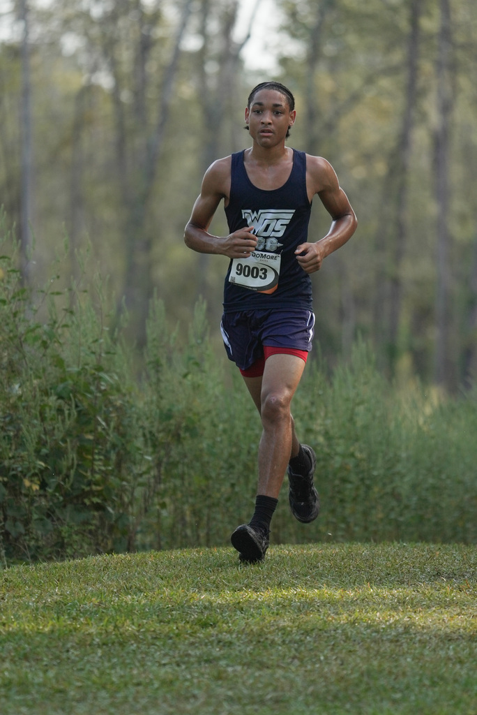 WOS boy running at cross country meet