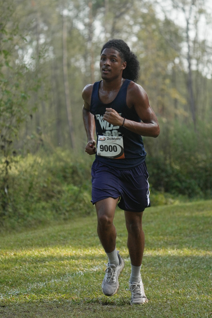 WOS boy running at cross country meet