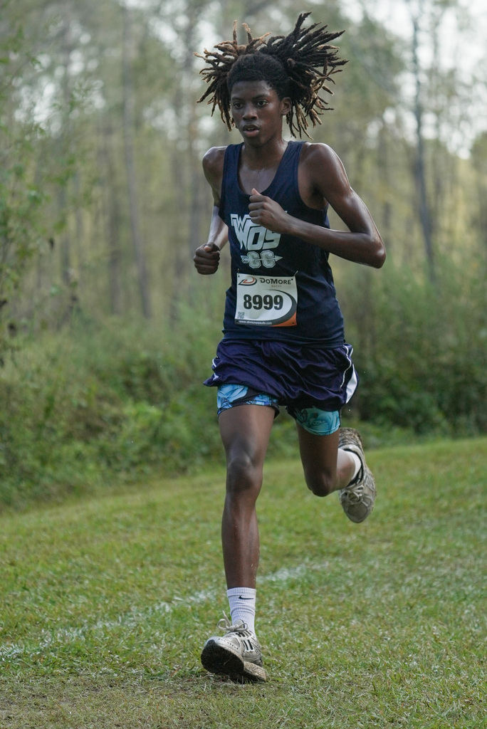 WOS boy running at cross country meet
