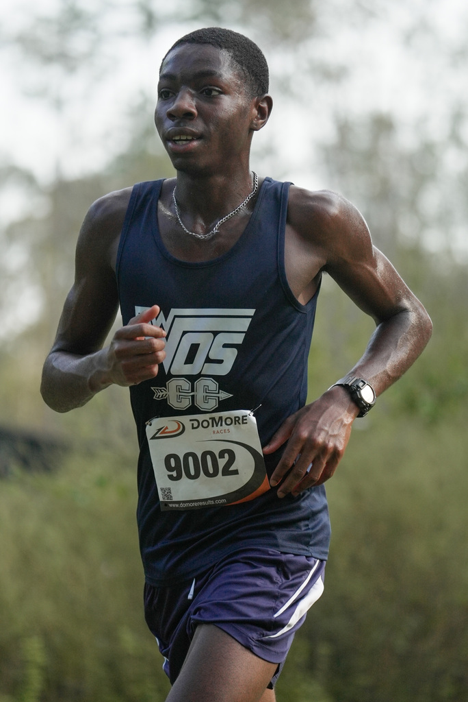 WOS boy running at cross country meet