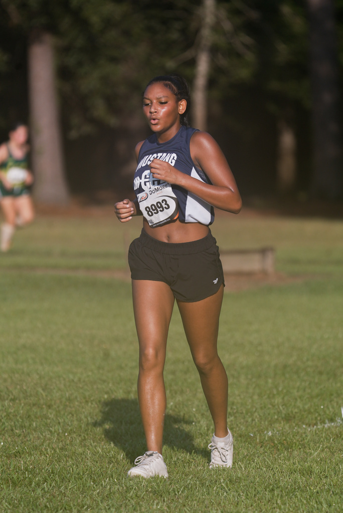 WOS girl running at cross country meet