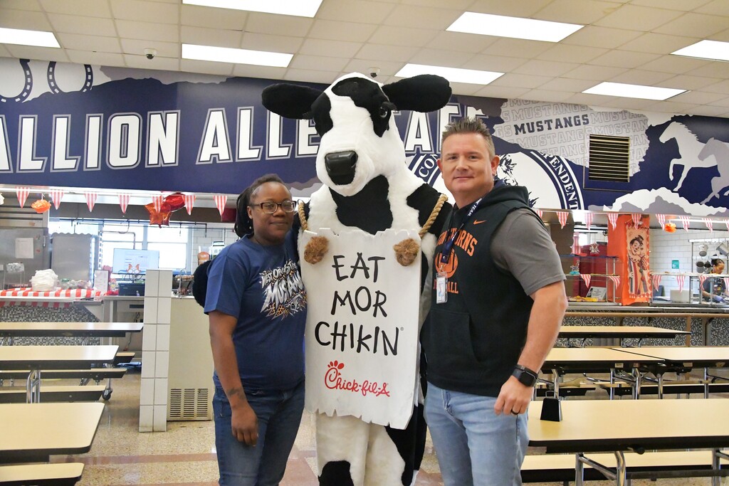 WOSMS Cafeteria lady and Asistant Principal with Cow mascot