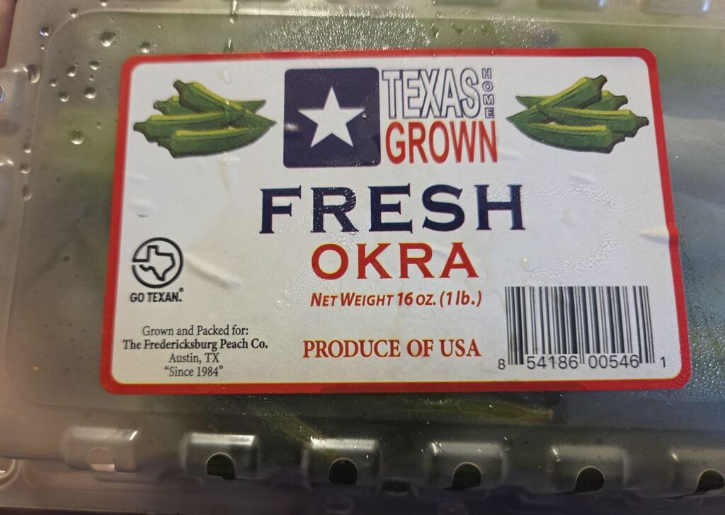 container with fresh okra
