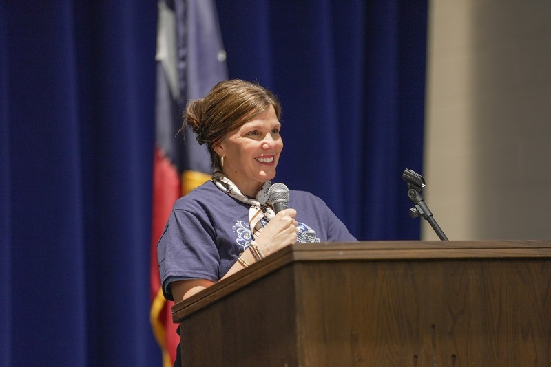 WOSE Principal Mrs. Oceguera talking at a podium