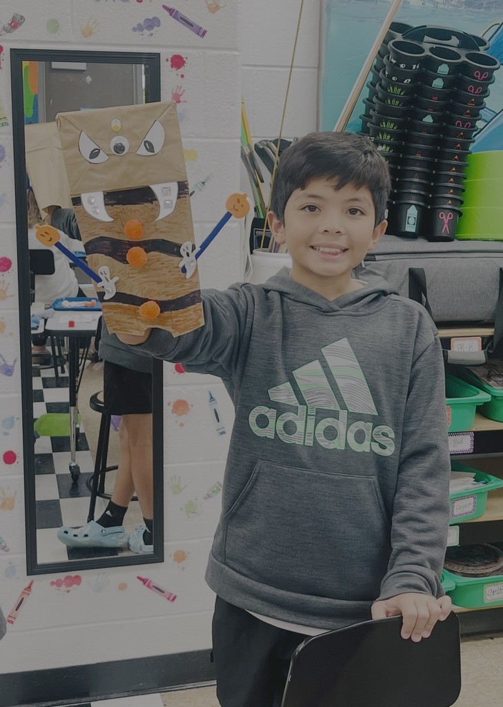 Student with is puppet