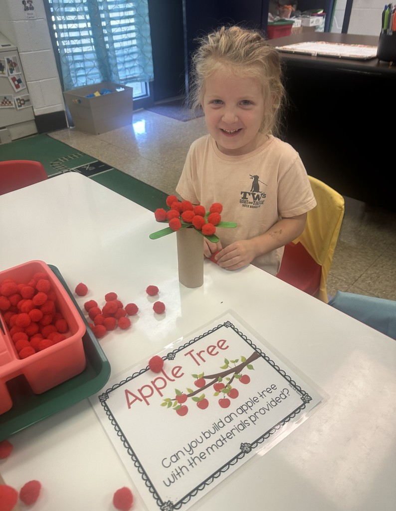 Student building an apple tree