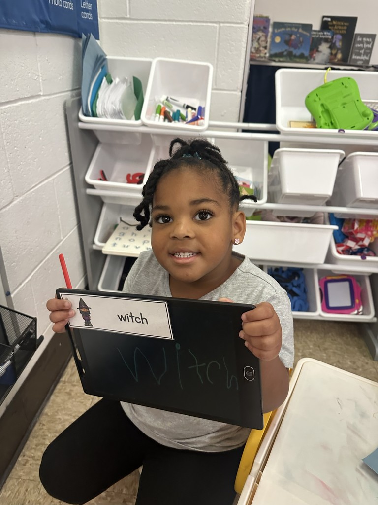 Student with her chalk board