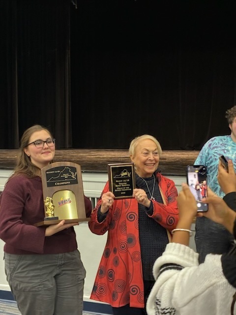 Receiving their awards
