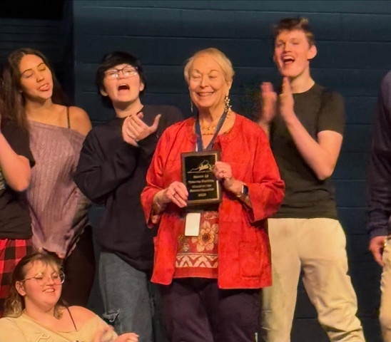 Ms. Hammond receiving her award