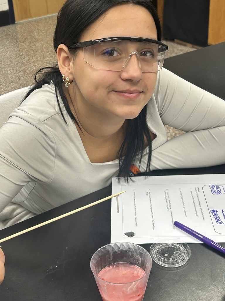 Student with Strawberry DNA sample