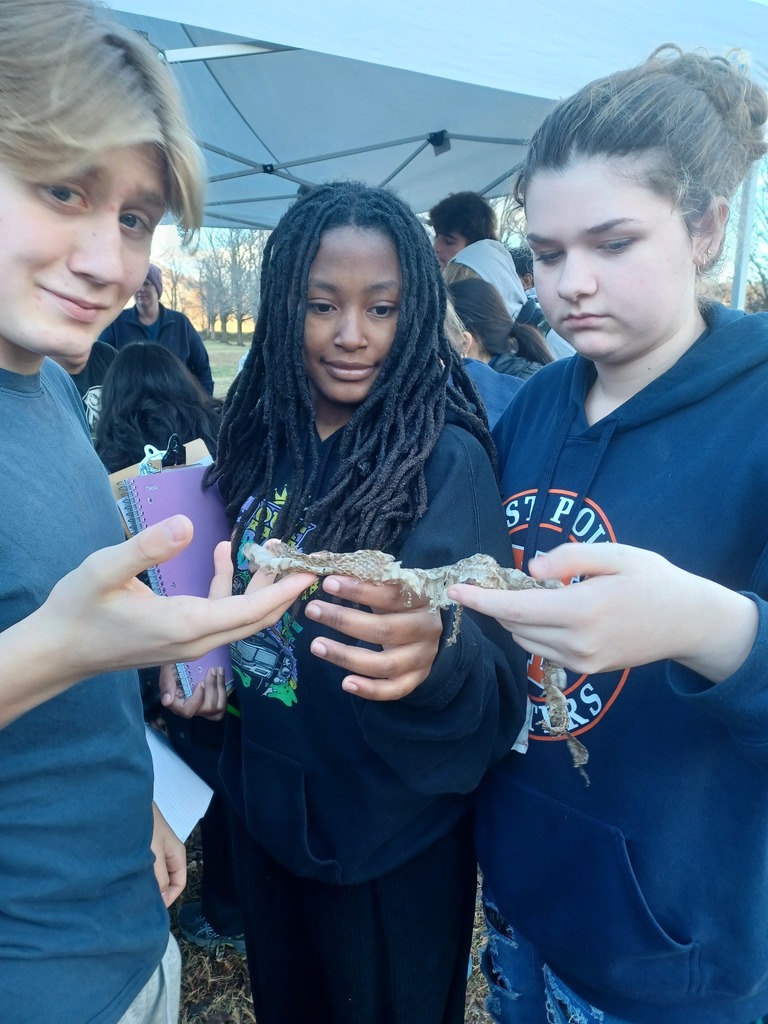 Students with a snake skin