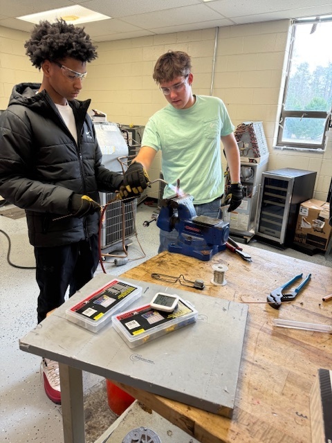 Student learning about welding