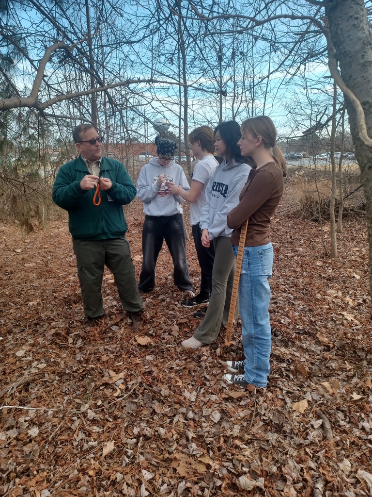 King William area forester Dave Slack talking  with WPHS Environmental Club members