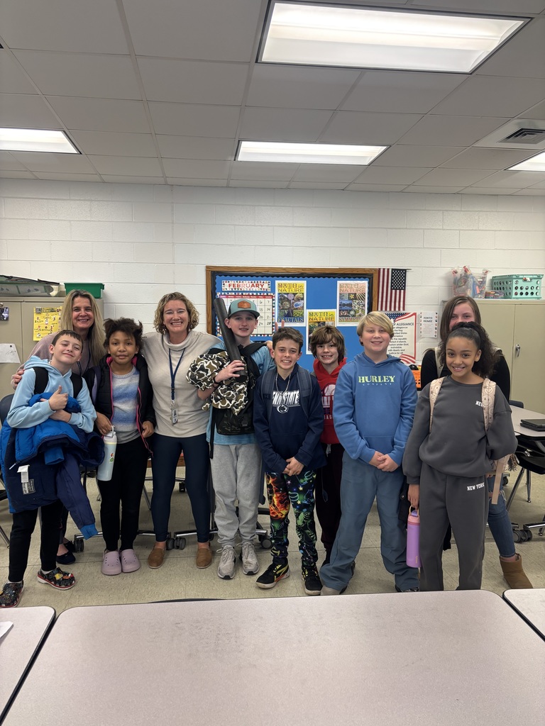 Students with Ms. Golden Pointer Puzzle Pals