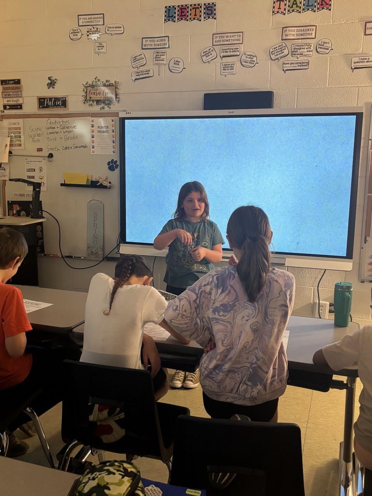 students sharing information about native american culture