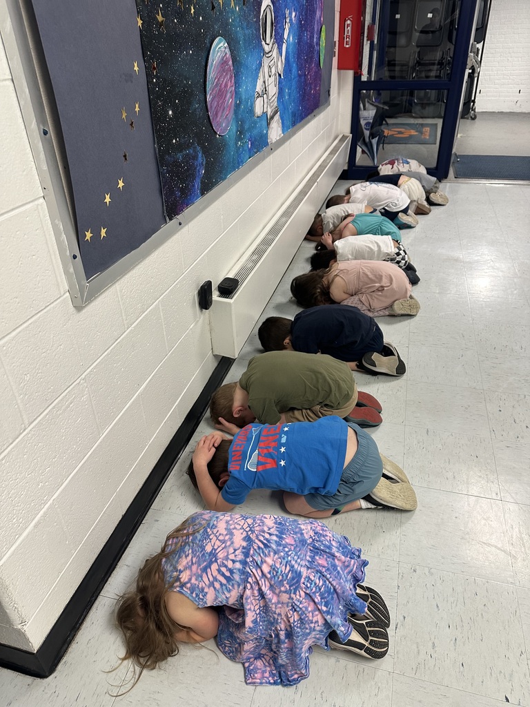 Practicing our turtle pose for National Tornado Safety Day