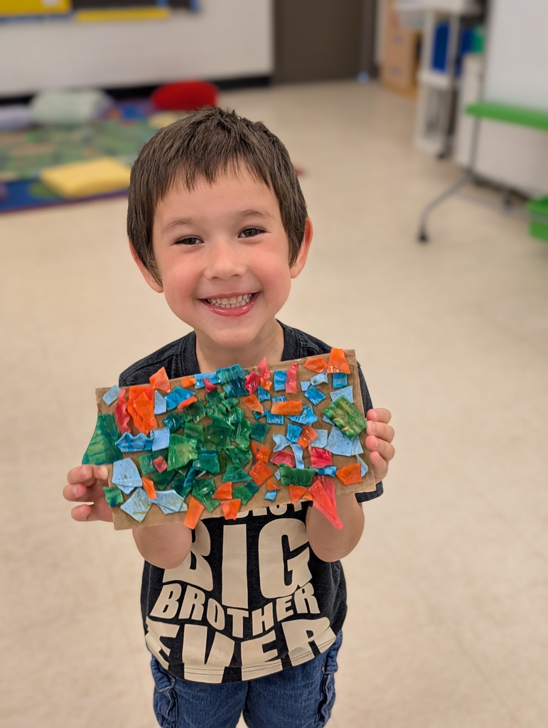 Student with art from summer academy