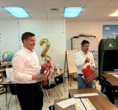 West Point Rotary talking to students about life jackets