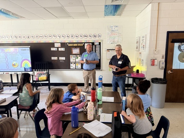 West Point Rotary talking to students about dictionaries